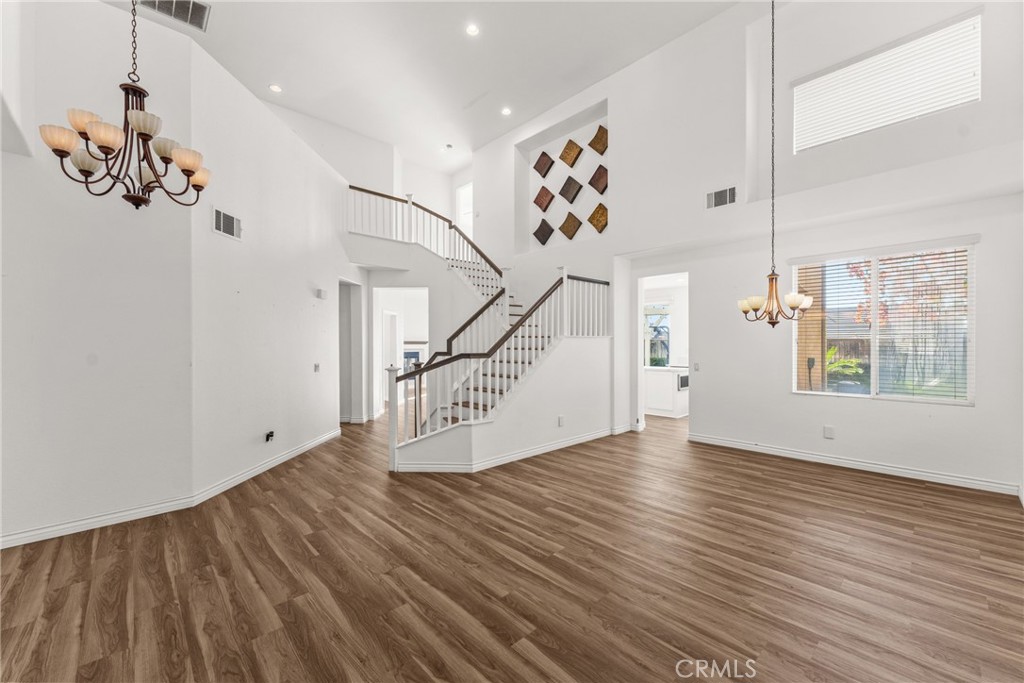 9749 Orange Street Rancho Cucamonga, CA 91737 - Photo 6 of 38 a view of an entryway with wooden floor