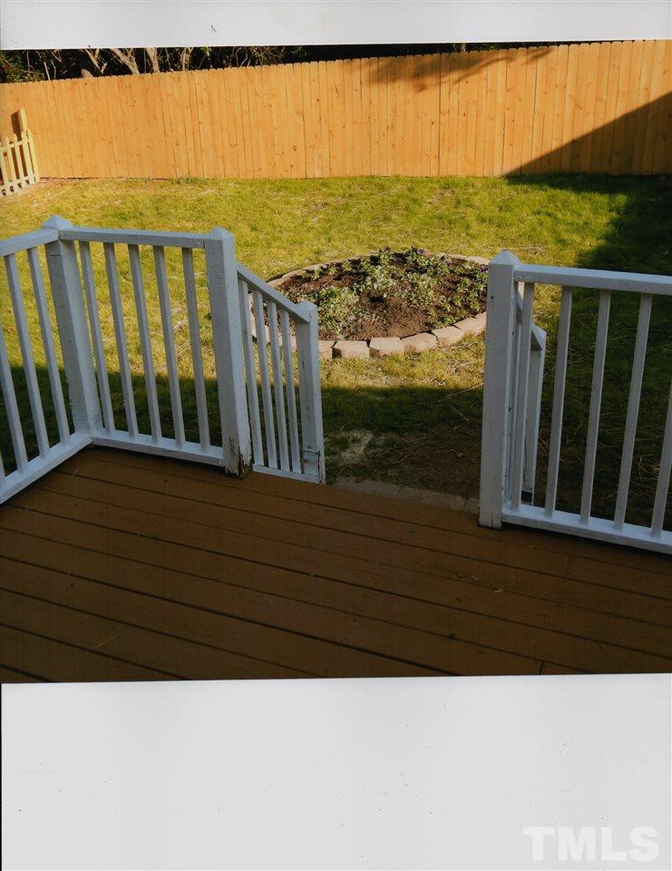 8200 Bellingham Circle Raleigh, NC 27615 - Photo 5 of 7 a view of a balcony with an ocean view