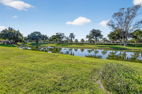 a view of a lake with a big yard