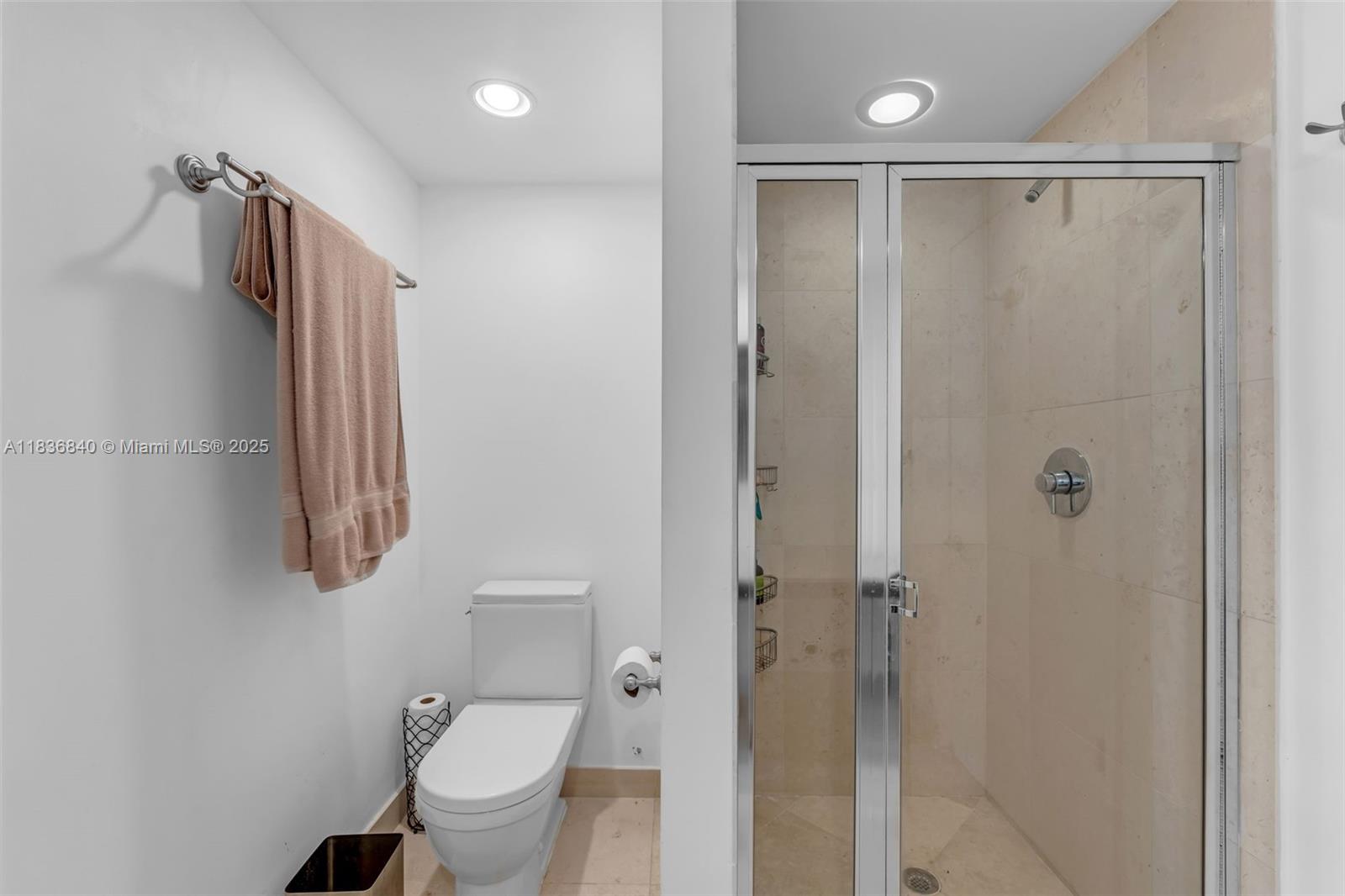 495 Brickell Avenue, Unit BAY1007 Miami, FL 33131 - Photo 23 of 34 a bathroom with a shower and a toilet