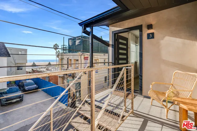 a view of a chairs and table on the terrace