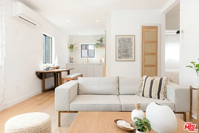 a living room with furniture and a couch