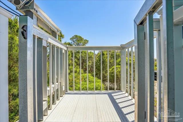 a backyard of a house with outdoor seating