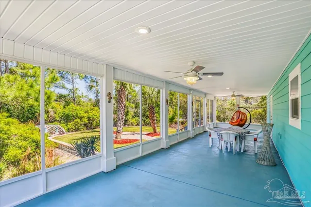 a view of a backyard with a patio