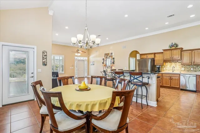 a bedroom with furniture and flat screen tv