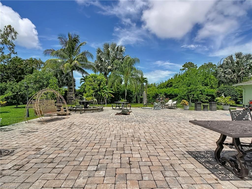 2280 Capri Court Naples, FL 34105 - Photo 37 of 49 a view of a backyard