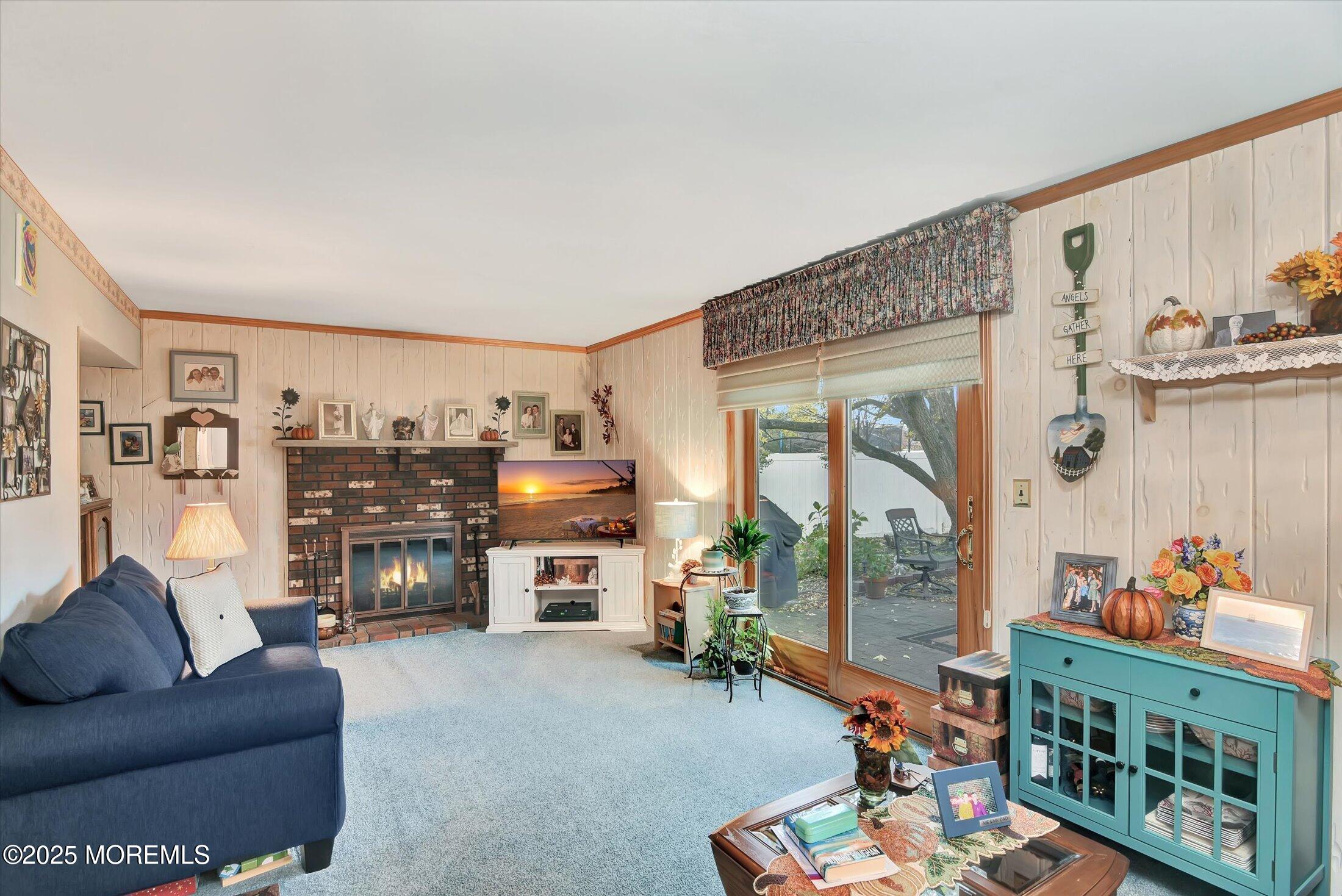 7 Nantucket Court Howell, NJ 07731 - Photo 17 of 39 a living room with furniture and a flat screen tv
