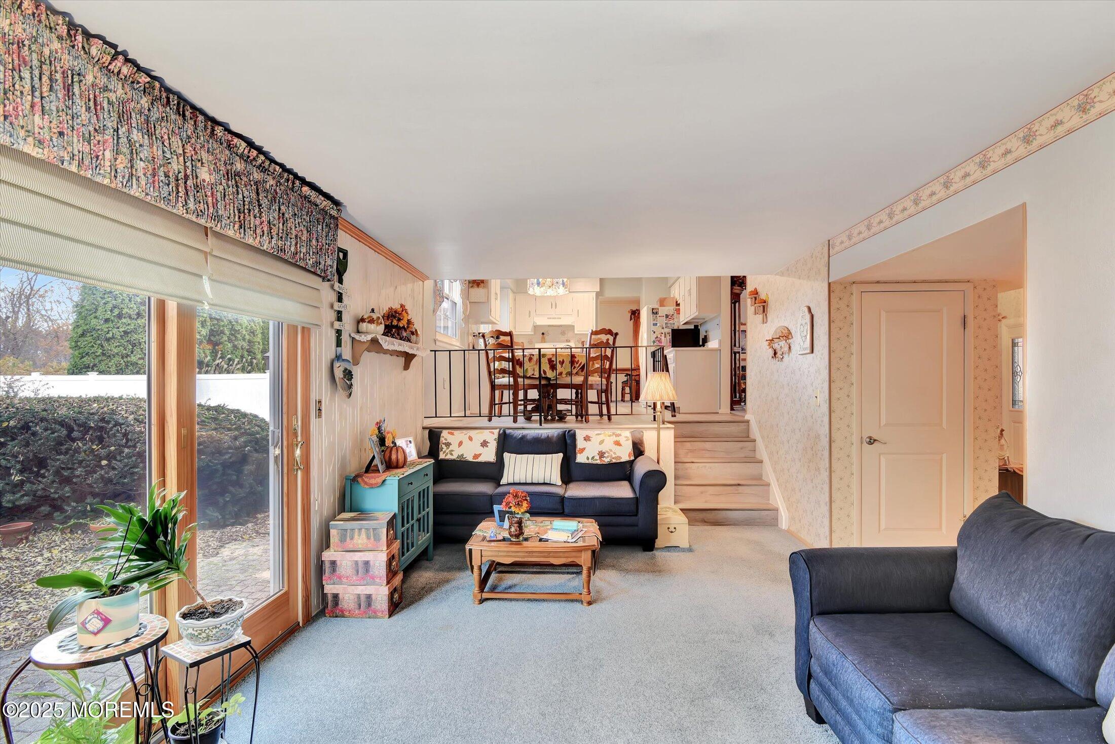 7 Nantucket Court Howell, NJ 07731 - Photo 19 of 39 a living room with furniture and a large window