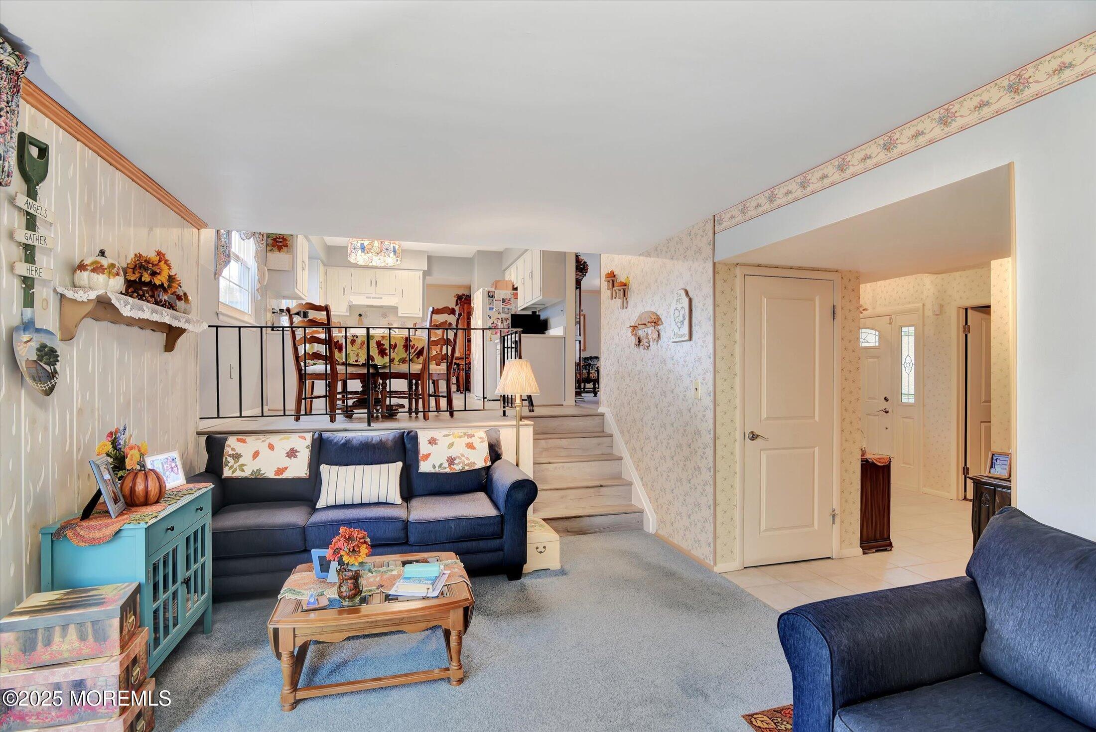 7 Nantucket Court Howell, NJ 07731 - Photo 20 of 39 a living room with furniture and a dining table