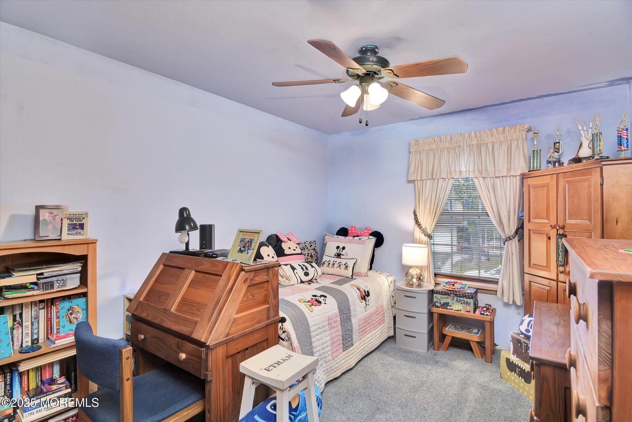 7 Nantucket Court Howell, NJ 07731 - Photo 26 of 39 a bedroom with furniture and a chandelier