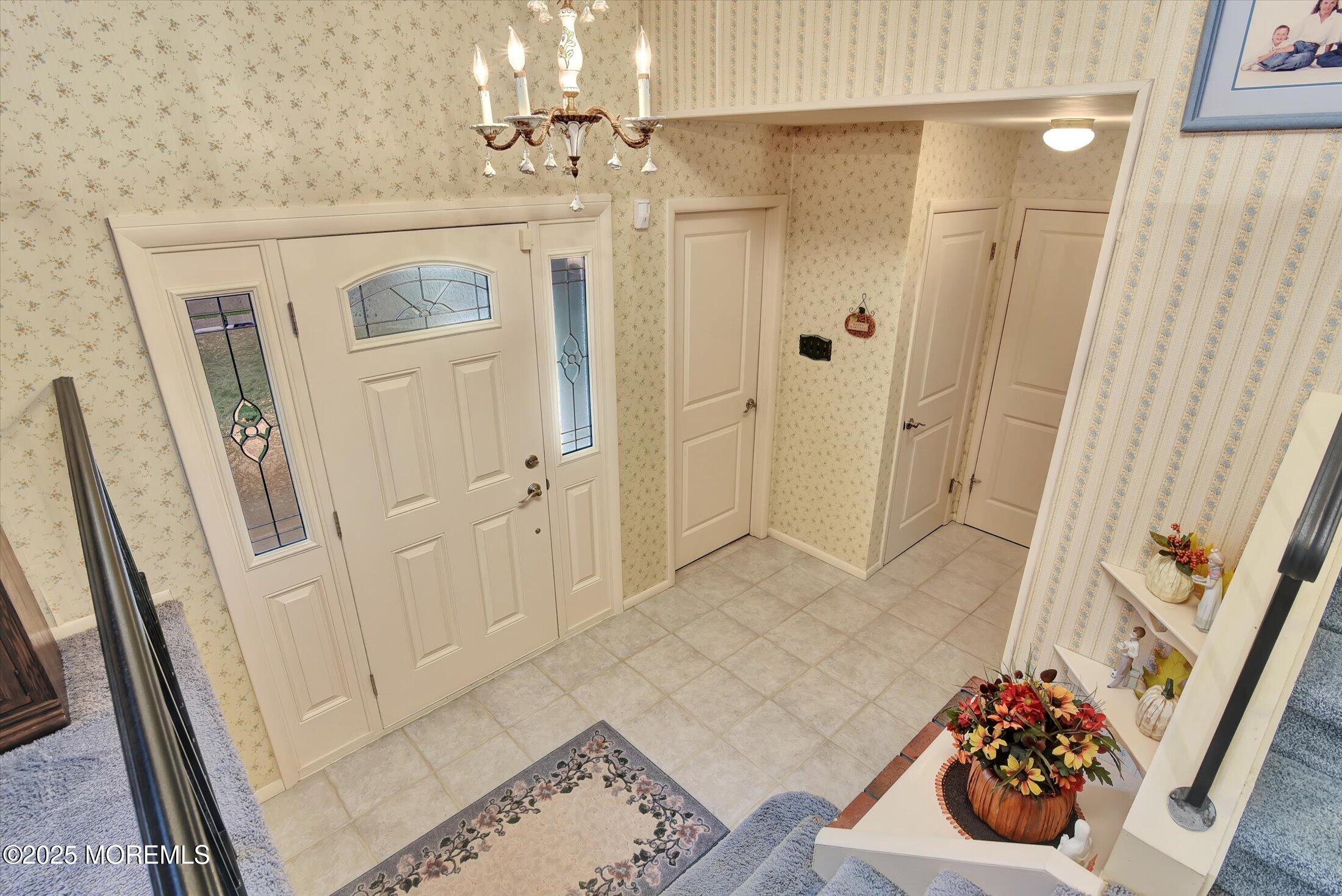 7 Nantucket Court Howell, NJ 07731 - Photo 5 of 39 a bathroom with a sink and mirror with bathtub