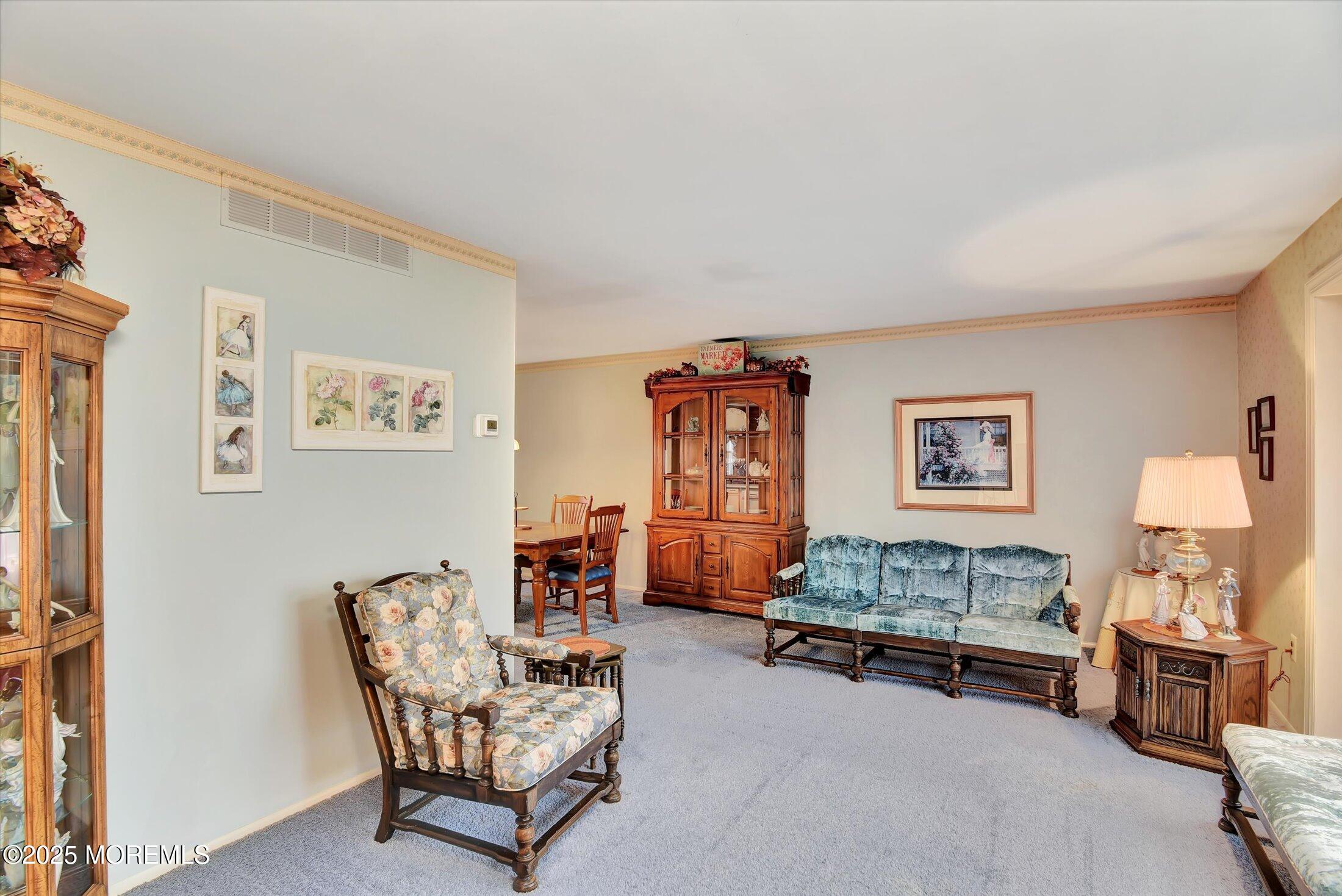 7 Nantucket Court Howell, NJ 07731 - Photo 9 of 39 a living room with furniture and a couch