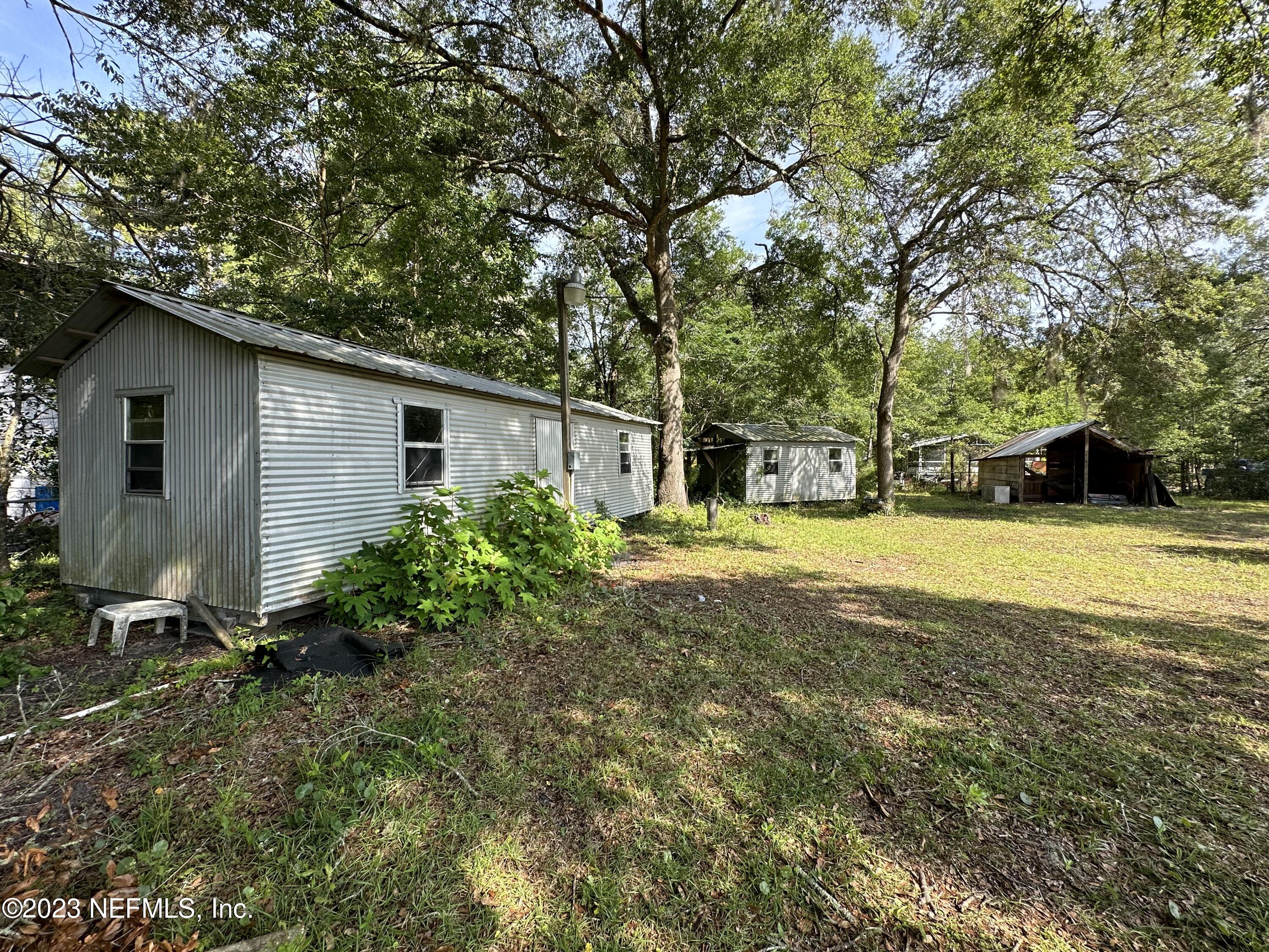 85713 Kirkland Road Yulee, FL 32097 - Photo 5 of 23 Sheds Back Yard