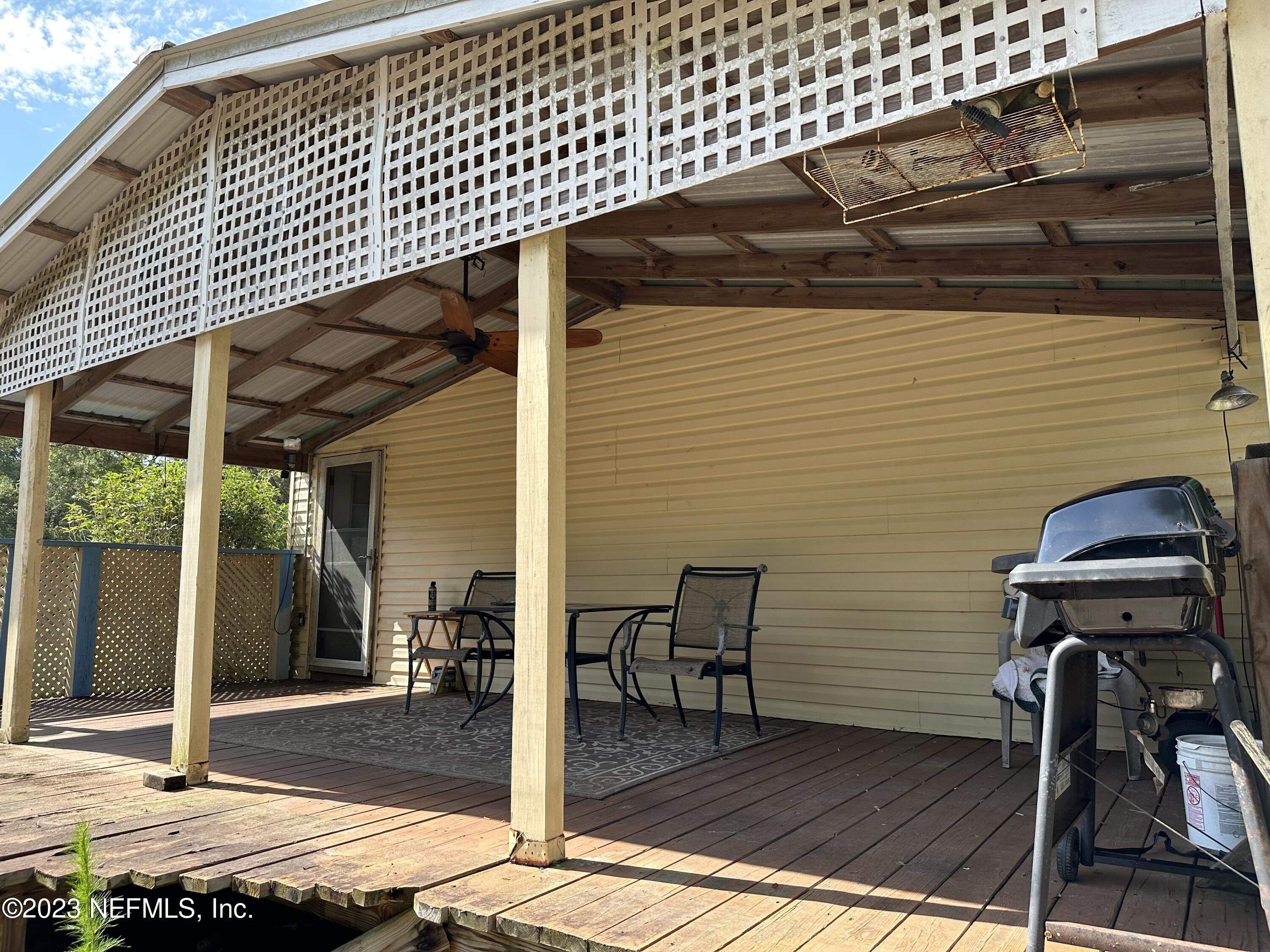 85713 Kirkland Road Yulee, FL 32097 - Photo 8 of 23 Side Porch From Master Bedroon