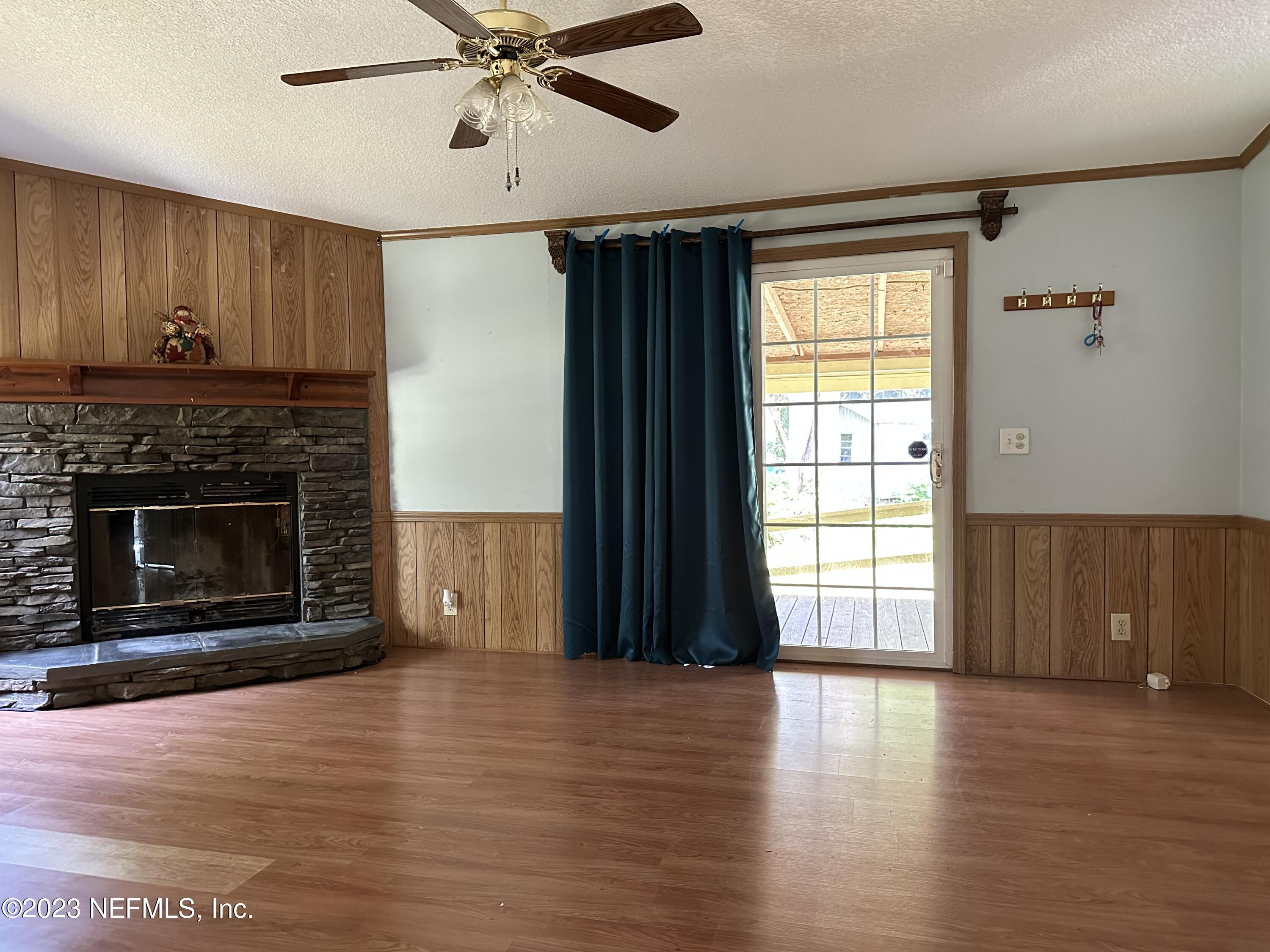 85713 Kirkland Road Yulee, FL 32097 - Photo 10 of 23 Family Room with Fireplace