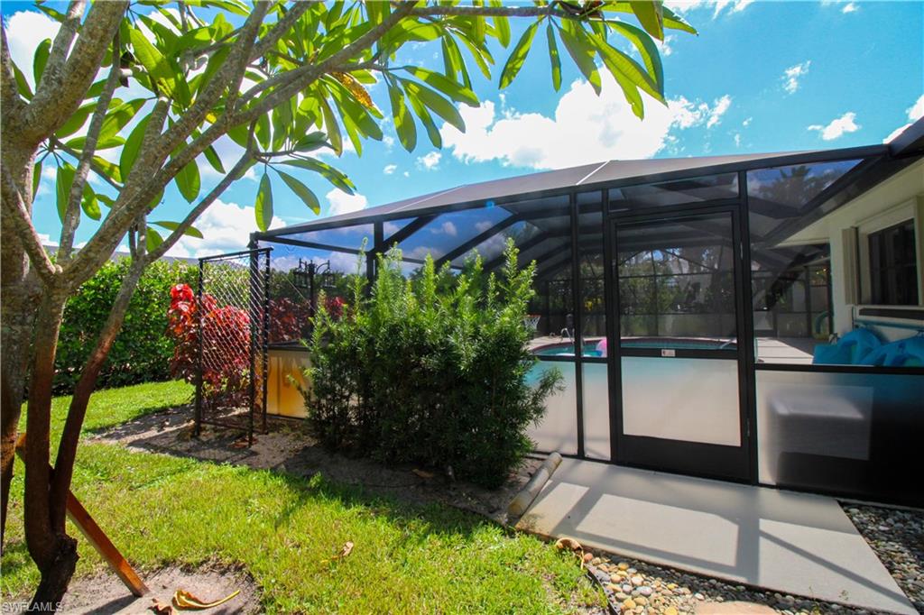 213 Bay Meadows Drive Naples, FL 34113 - Photo 48 of 50 a view of a backyard