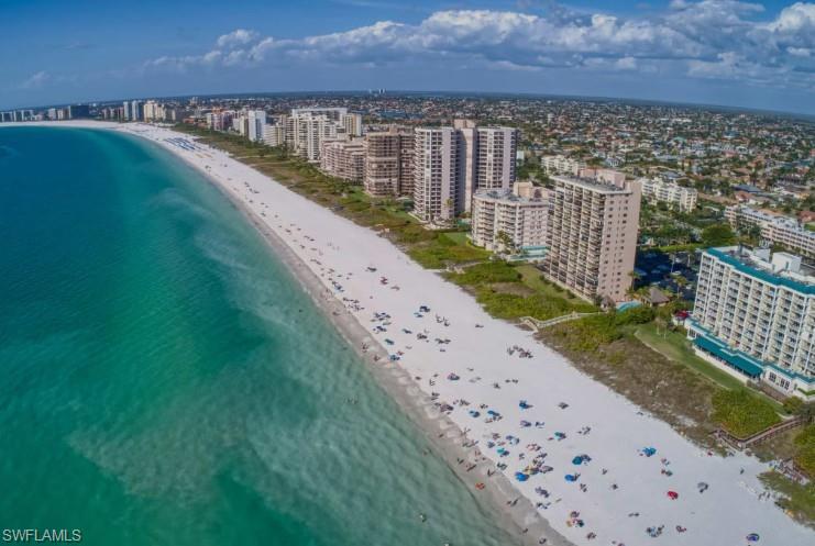 213 Bay Meadows Drive Naples, FL 34113 - Photo 49 of 50 a view of a city and an ocean view