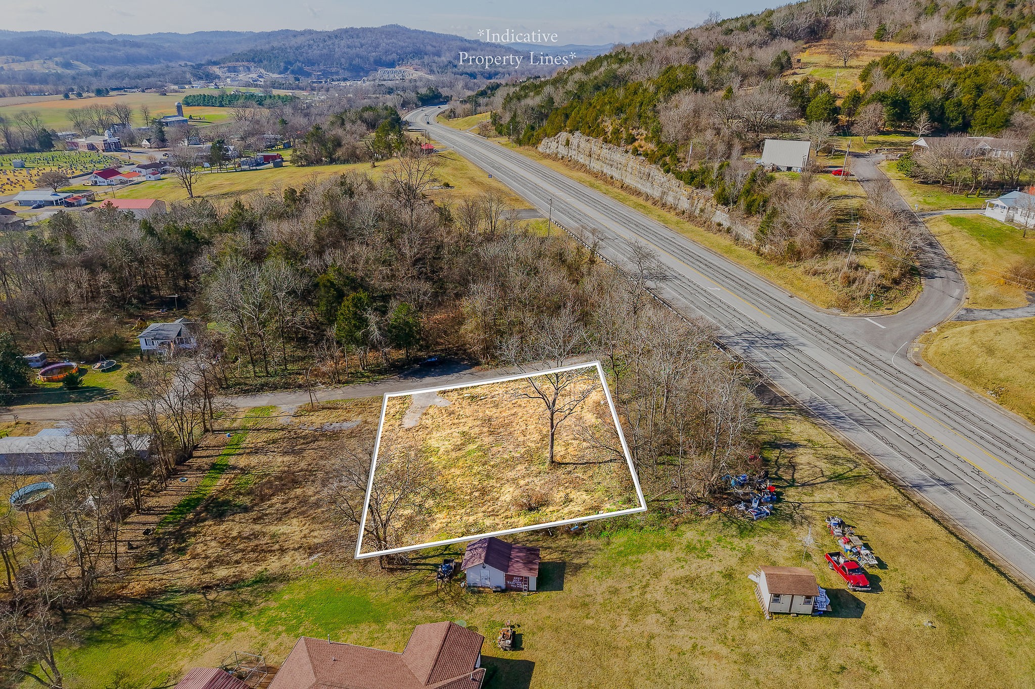 114 Stone Street Liberty, TN 37095 - Photo 3 of 14 a view of a yard with wooden fence