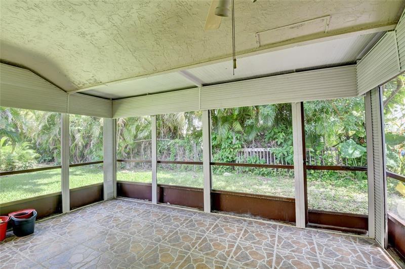 9316 Ketay Circle Boca Raton, FL 33428 - Photo 26 of 30 a view of a room with window and an outdoor space