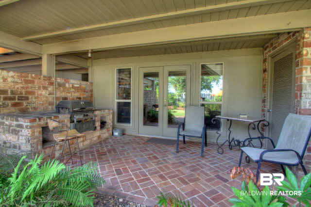 22701 Ecor Rouge Lane Fairhope, AL 36532 - Photo 6 of 45 side porch