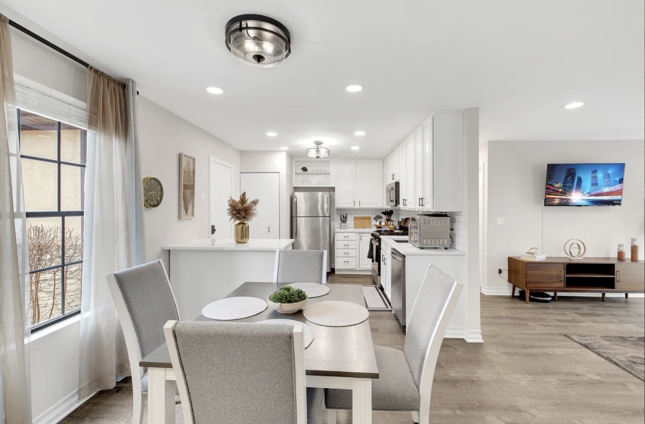 379 Sandhurst Circle, Unit 1 Glen Ellyn, IL 60137 - Photo 17 of 20 a dining room with furniture and window