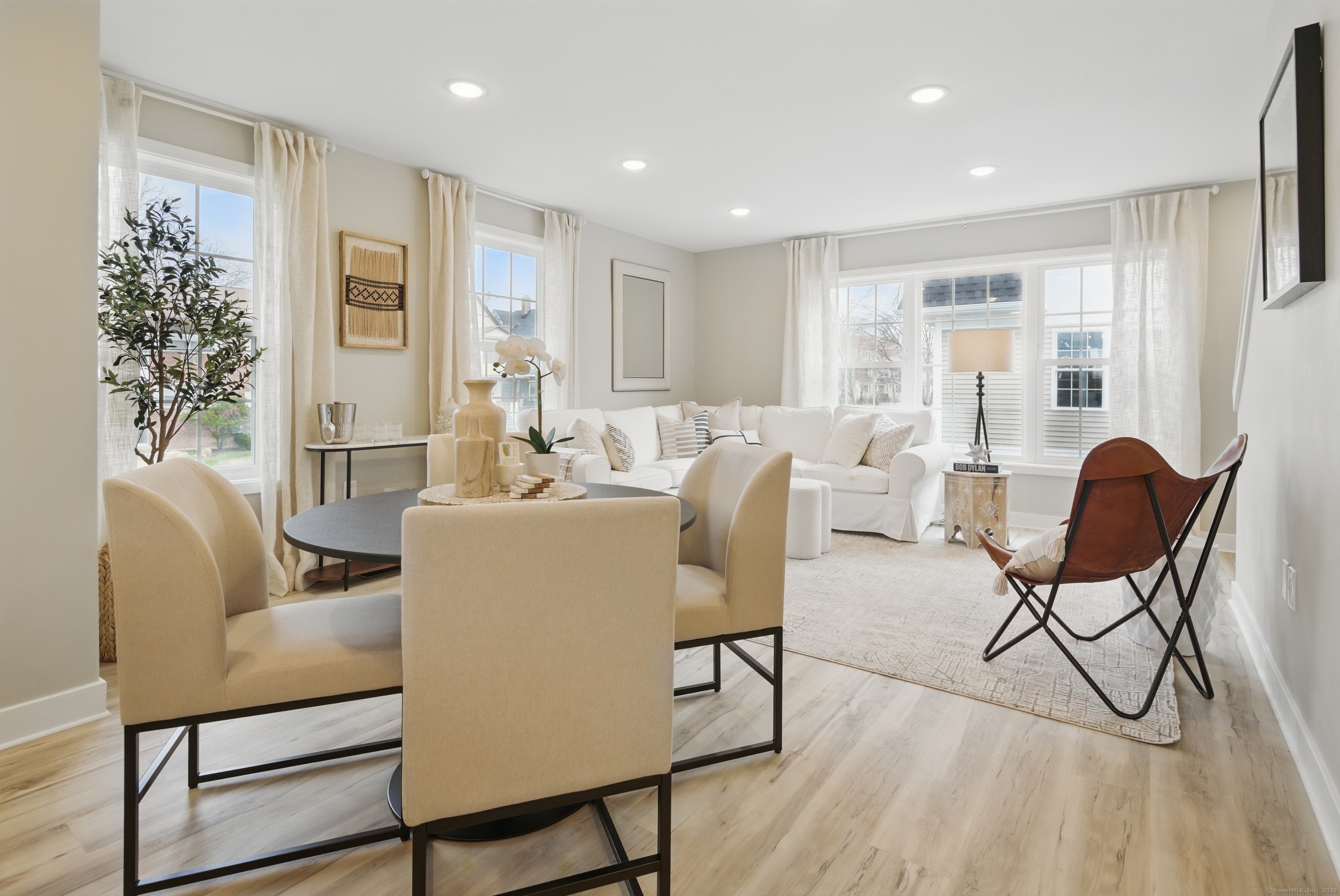 409 Prospect Avenue, Unit 5 West Hartford, CT 06119 - Photo 6 of 25 a living room with furniture and a wooden floor
