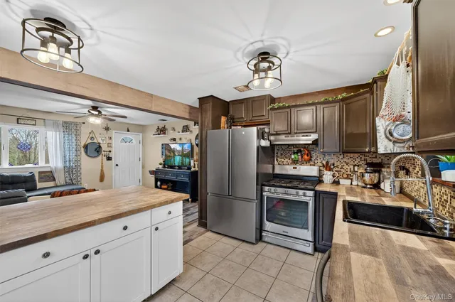 a view of backyard with swimming pool