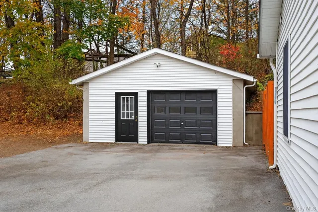 a view of a house with a garage