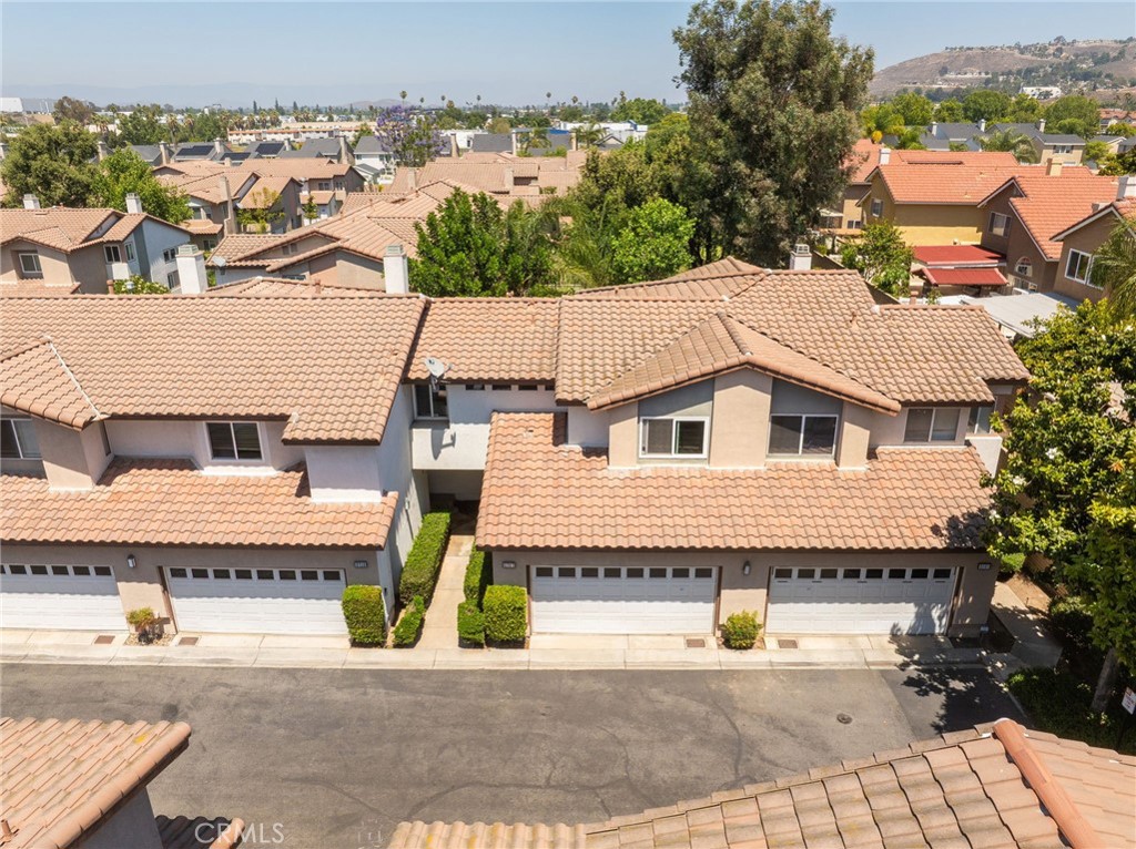 3707 Calle Curacso Riverside, CA 92503 - Photo 30 of 43 an aerial view of a house with a garden and mountain view
