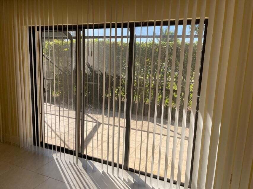 7722 Solimar Circle Boca Raton, FL 33433 - Photo 5 of 36 SLIDER TO PATIO
