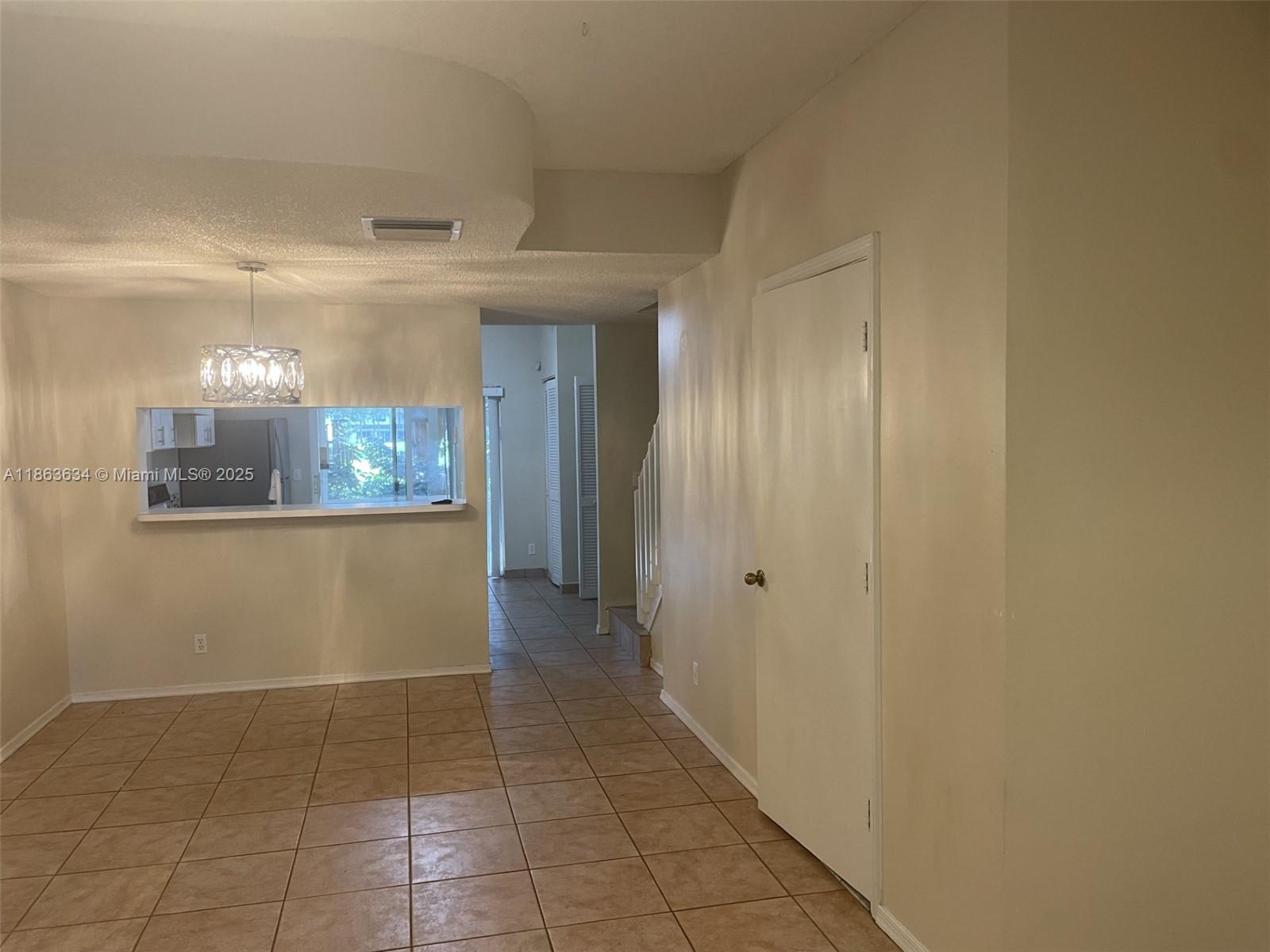 145 Southwest 96th Terrace, Unit 145 Plantation, FL 33324 - Photo 23 of 39 a view of a hallway