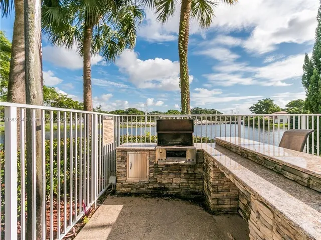a view of a terrace with chairs