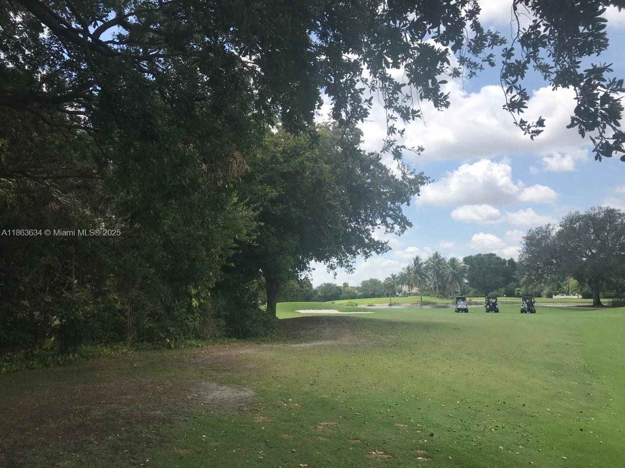 145 Southwest 96th Terrace, Unit 145 Plantation, FL 33324 - Photo 6 of 39 a view of lake with outdoor space