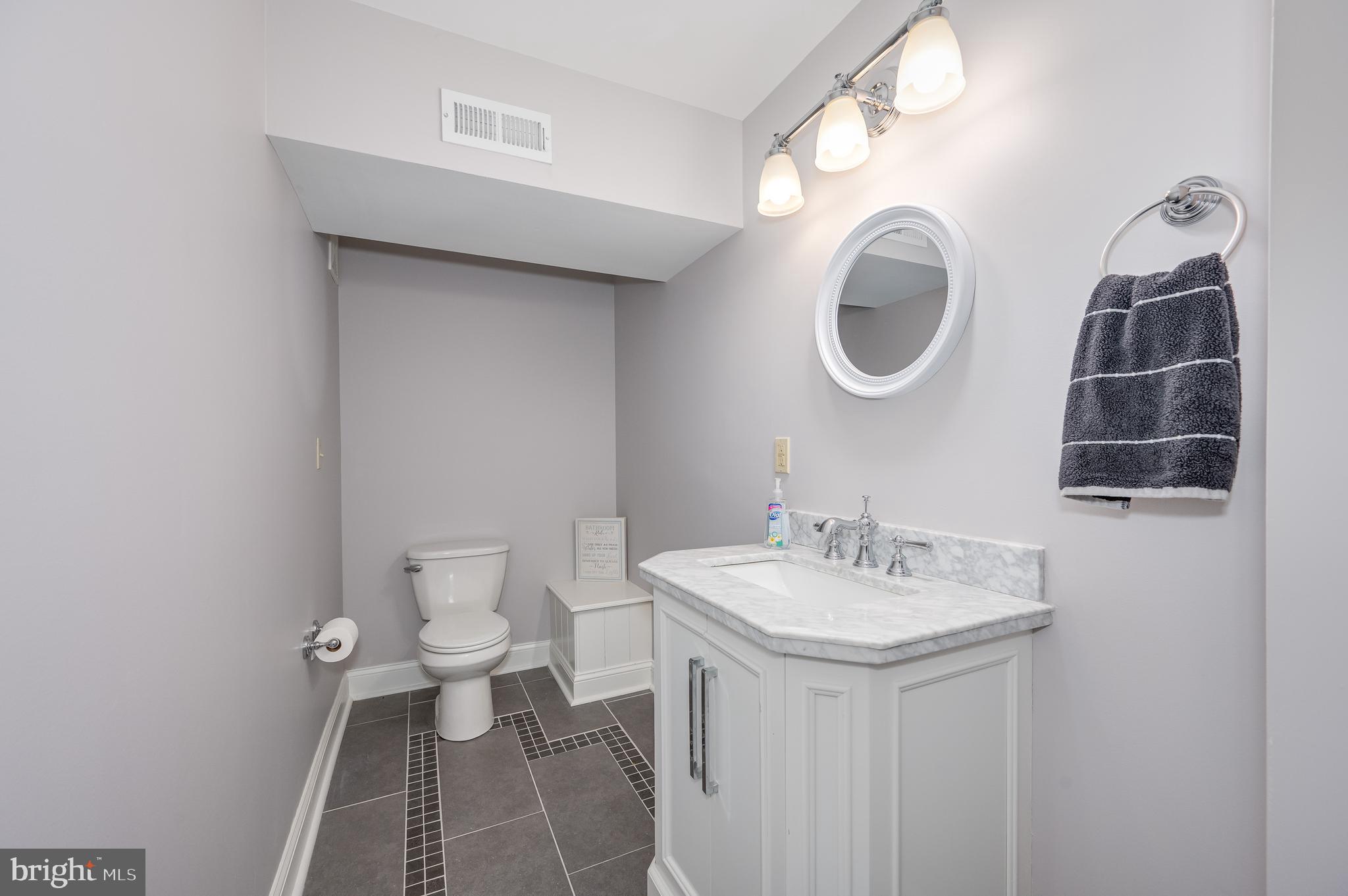 874 Pheasant Hill Road Summit Point, WV 25446 - Photo 54 of 145 Lower level half bath