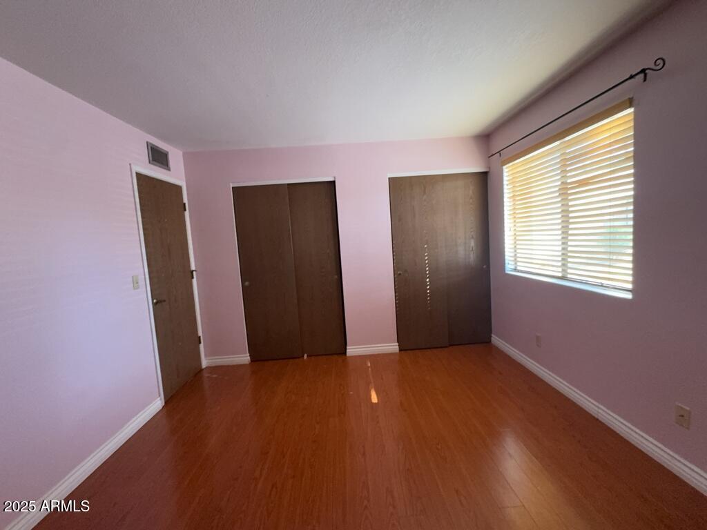4305 Ave Palermo, Unit C Sierra Vista, AZ 85635 - Photo 10 of 15 a view of an empty room with closet and a window