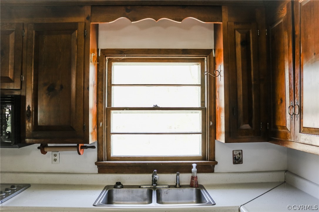 5601 Qualla Road Chesterfield, VA 23832 - Photo 11 of 24 a bathroom with a sink and a mirror