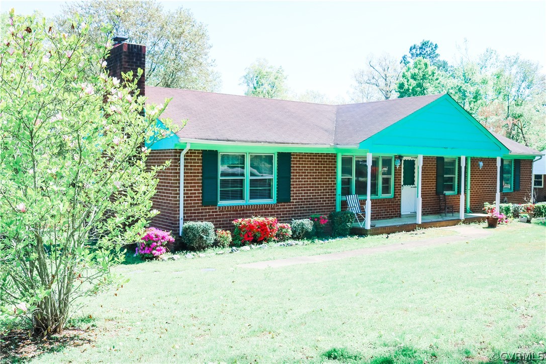 5601 Qualla Road Chesterfield, VA 23832 - Photo 3 of 24 a front view of a house with garden