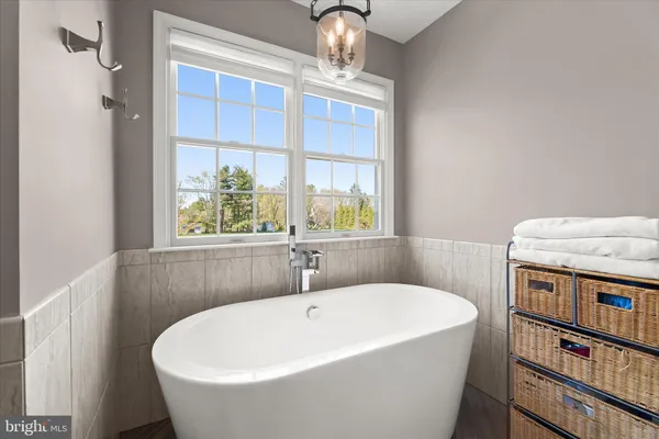 a view of a house with a yard and garage