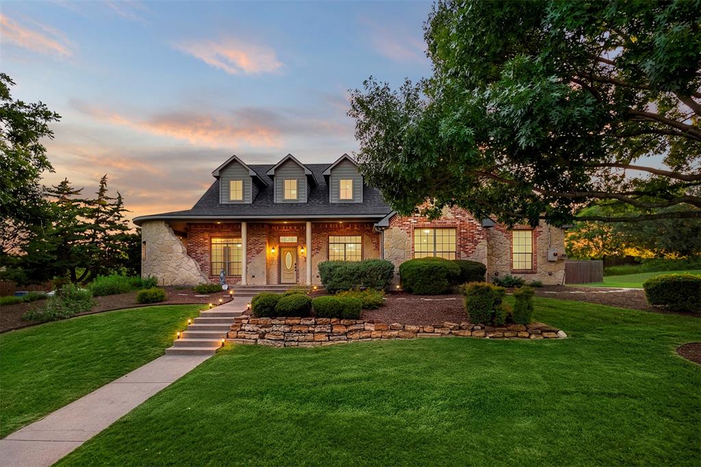 105 Country Ridge Court Red Oak, TX 75154 - Photo 1 of 40 a front view of house with yard and green space