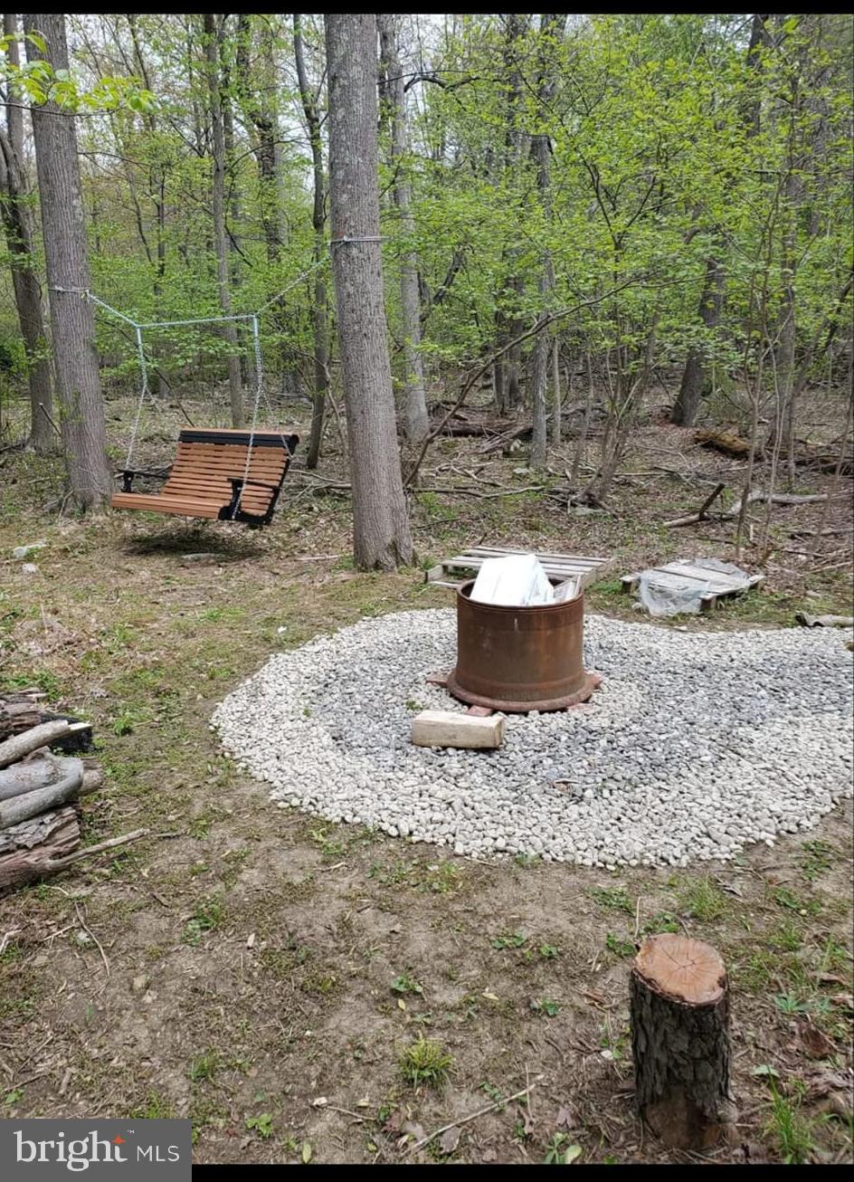Fox Tower Thurmont, MD 21788 - Photo 3 of 11 a view of a backyard with sitting area