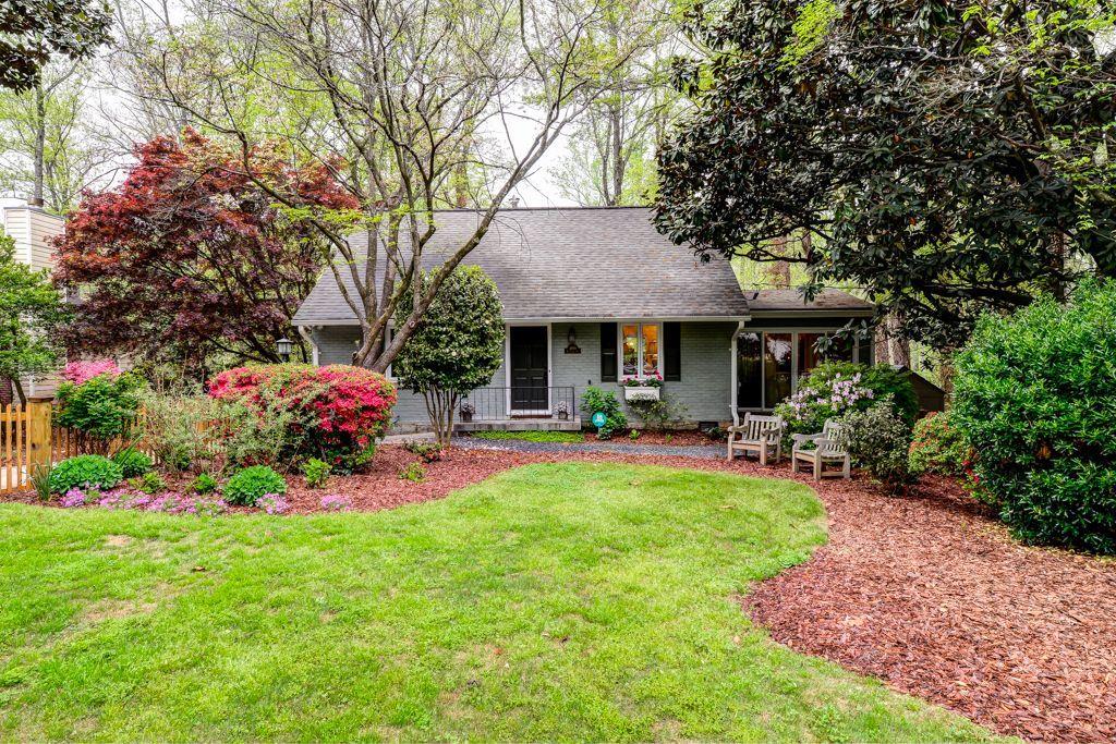 2690 Ridgemore Road Northwest Atlanta, GA 30318 - Photo 1 of 1 Azaleas galore and lush landscaping in flat fenced in front yard on quiet part of popular Ridgemore Heights