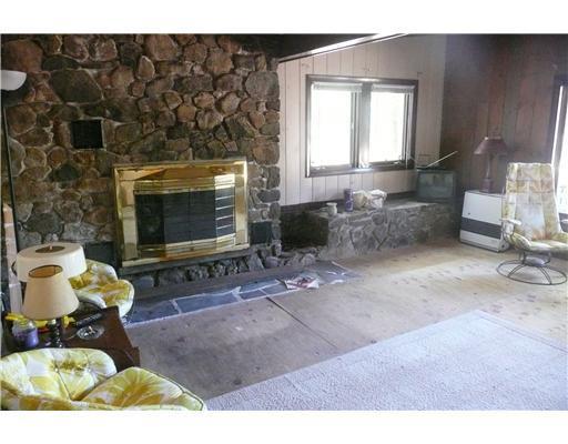 328 Northwest River Road Sebago, ME 04029 - Photo 7 of 12 Living Room. Living Room with Stone...