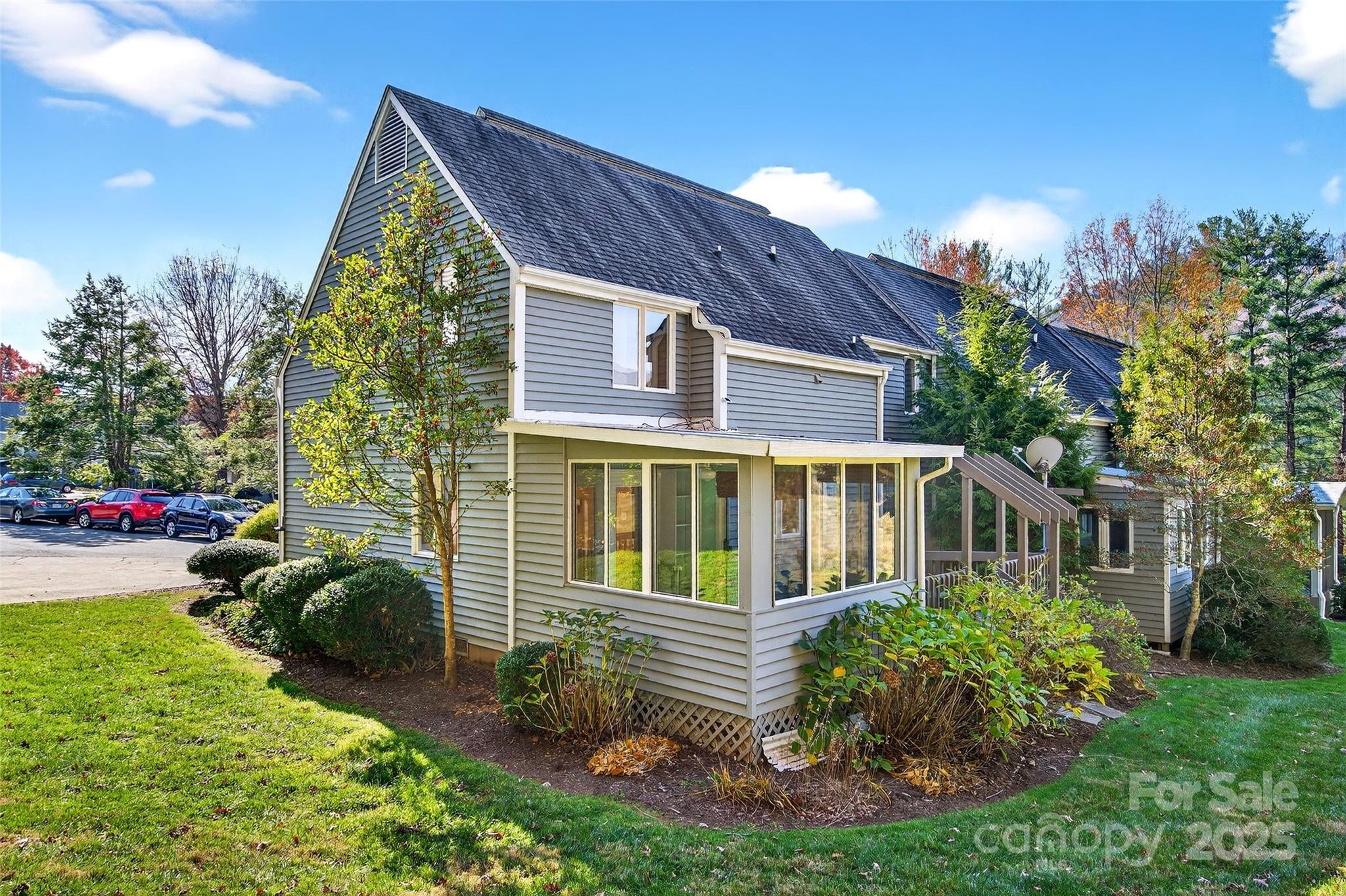3 B Lynx Drive Black Mountain, NC 28711 - Photo 1 of 35 a view of a house with a yard and sitting area