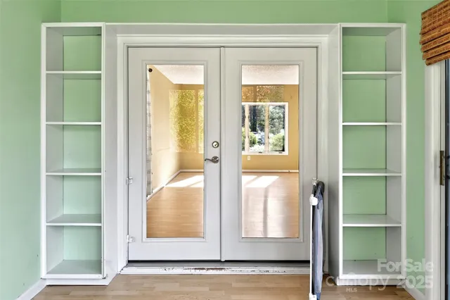 a kitchen with a sink stove top oven and refrigerator