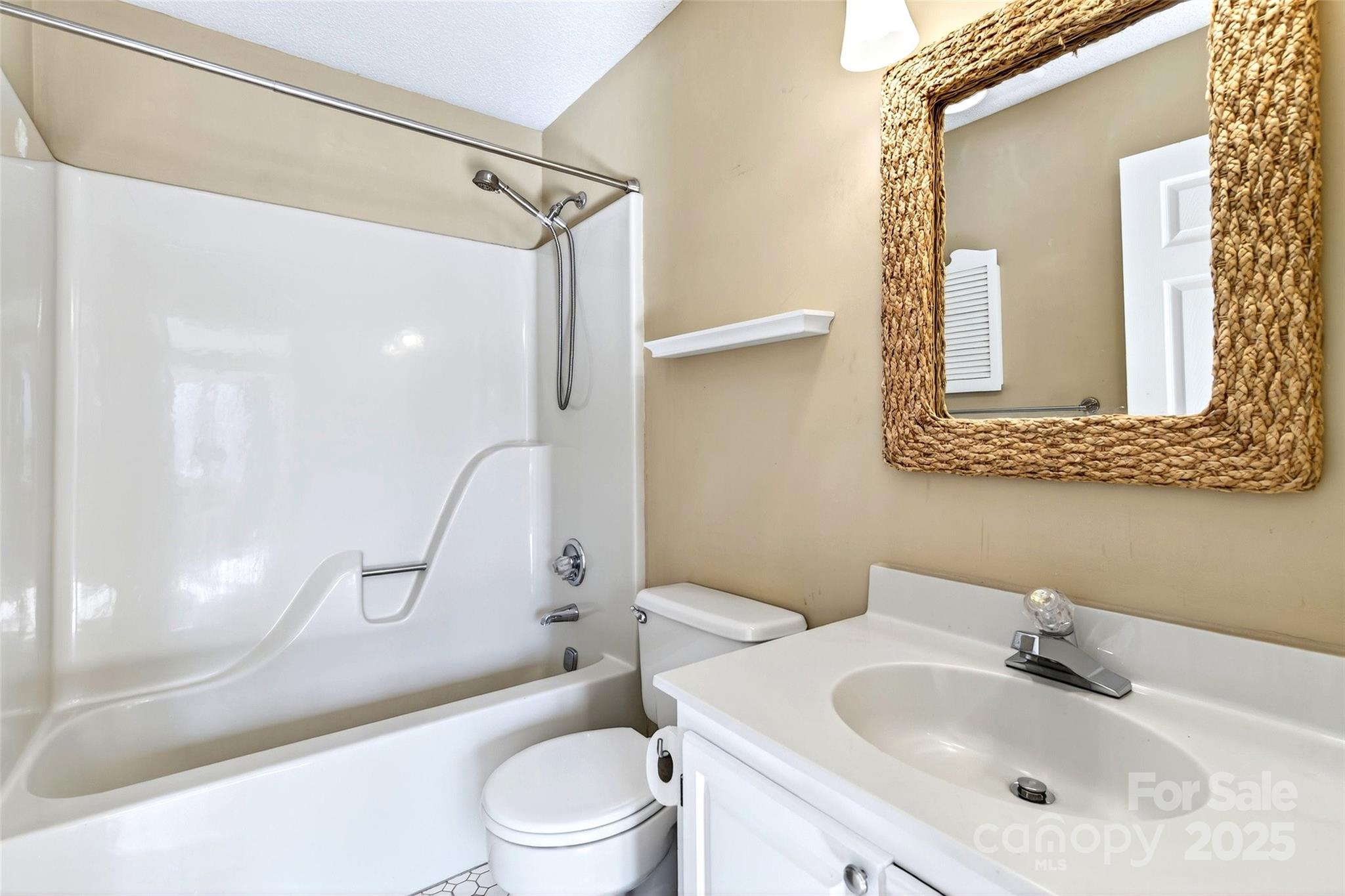 3 B Lynx Drive Black Mountain, NC 28711 - Photo 20 of 35 a bathroom with a sink a toilet and shower