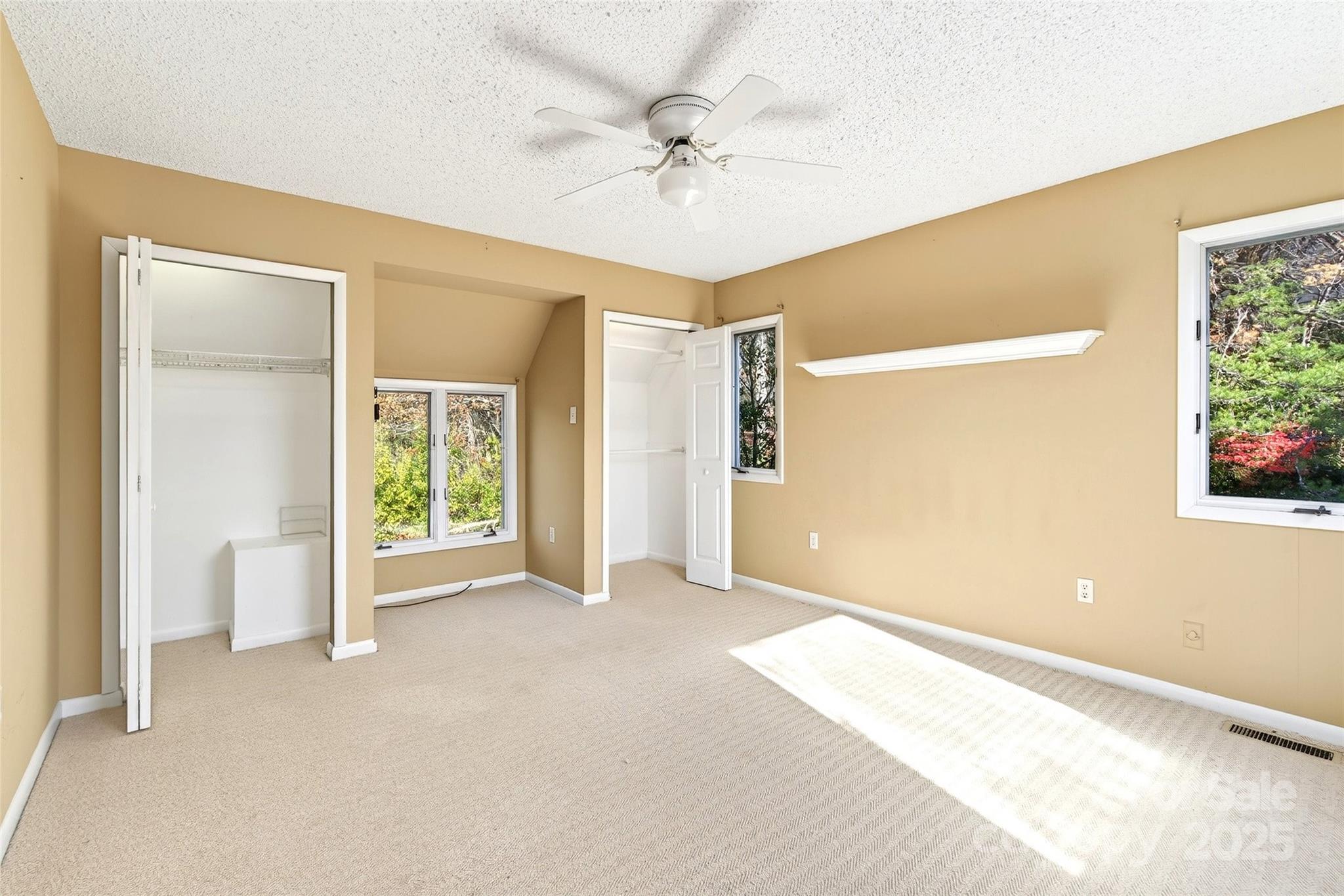3 B Lynx Drive Black Mountain, NC 28711 - Photo 26 of 35 a view of a room with a ceiling fan and a window