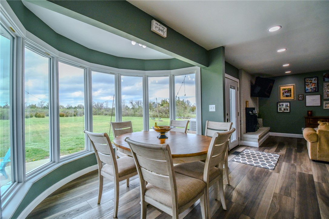 6169 Dayton Farmersville Road Dayton, OH 45417 - Photo 20 of 64 Enjoy views of nature from this bright dining space, perfect for everyday meals and gatherings.
