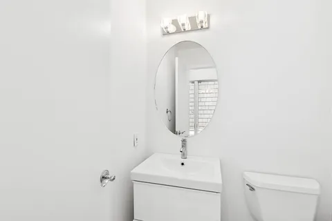 a bathroom with a sink and a toilet