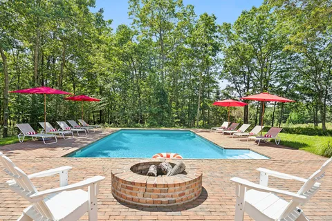 a outdoor space with pool and furniture