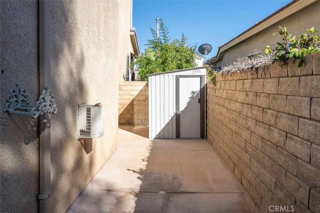 25443 Hopkins Place Stevenson Ranch, CA 91381 - Photo 54 of 68 Storage shed on the sideyard